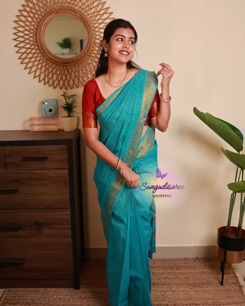 Sky blue saree with red blouse